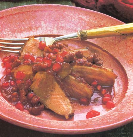 pechugas de pato con salsa de nueces y granadas